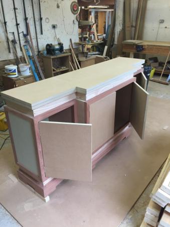 Custom-built bedroom furniture being made.